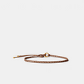 Shop Rescue Spa Salta belt in canyon brown braided suede and neoprene with a gold-tone ring buckle