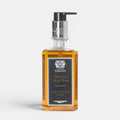 Shop Rescue Spa Antica Farmacista Sandalwood Amber hand and body wash in a clear bottle with a silver pump dispenser.