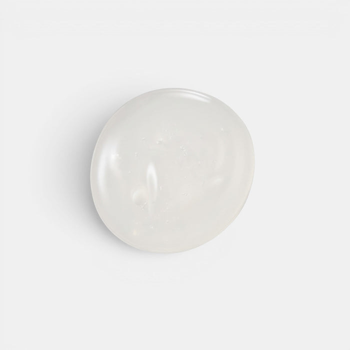 Shop Rescue Spa Scalp Booster Shampoo with a clear, gel-like texture isolated on a white background.