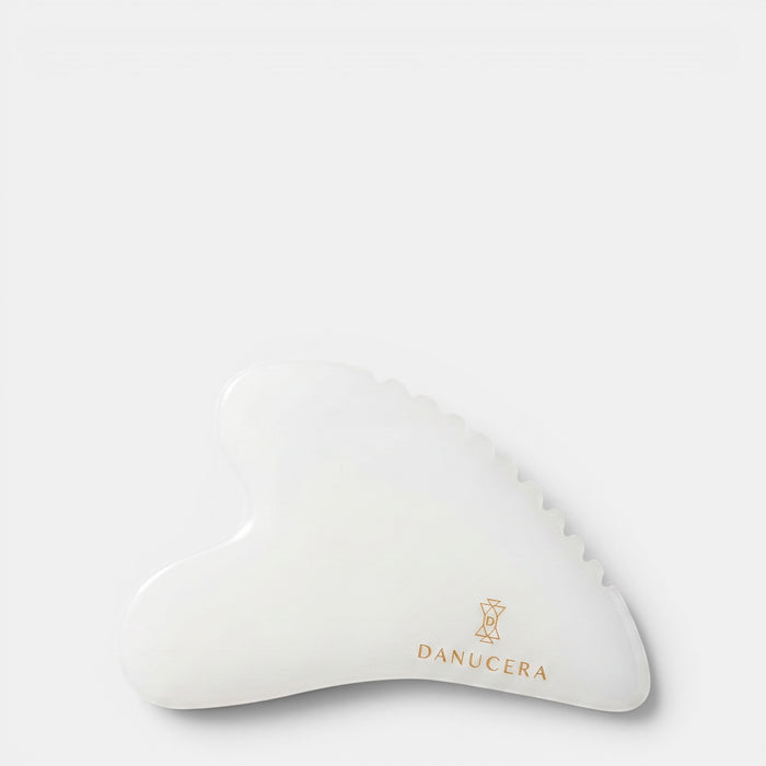 Shop Rescue Spa DANUCERA Sculpting Stone made of white jade for facial massage, lifting, and toning.