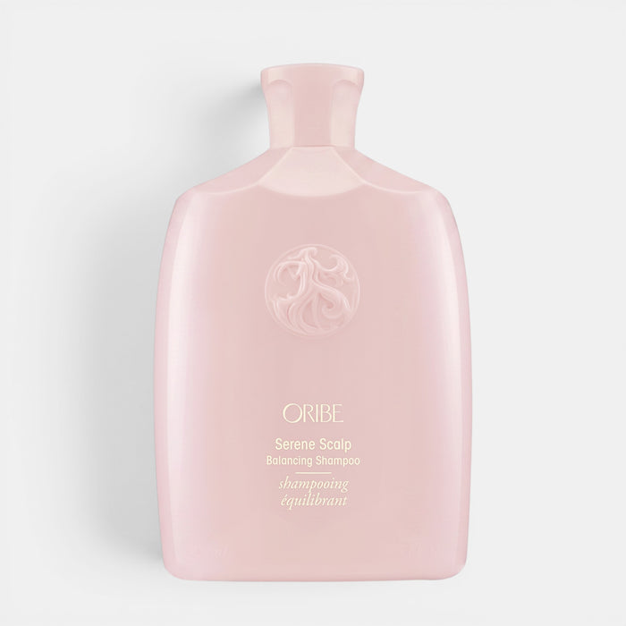 Shop Rescue Spa Oribe Serene Scalp anti-dandruff shampoo in a pale pink bottle with embossed logo