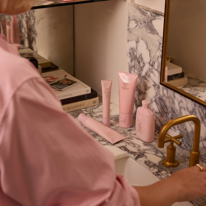 Shop Rescue Spa Serene Scalp Balancing Conditioner in pink packaging, hydrating and soothing hair.