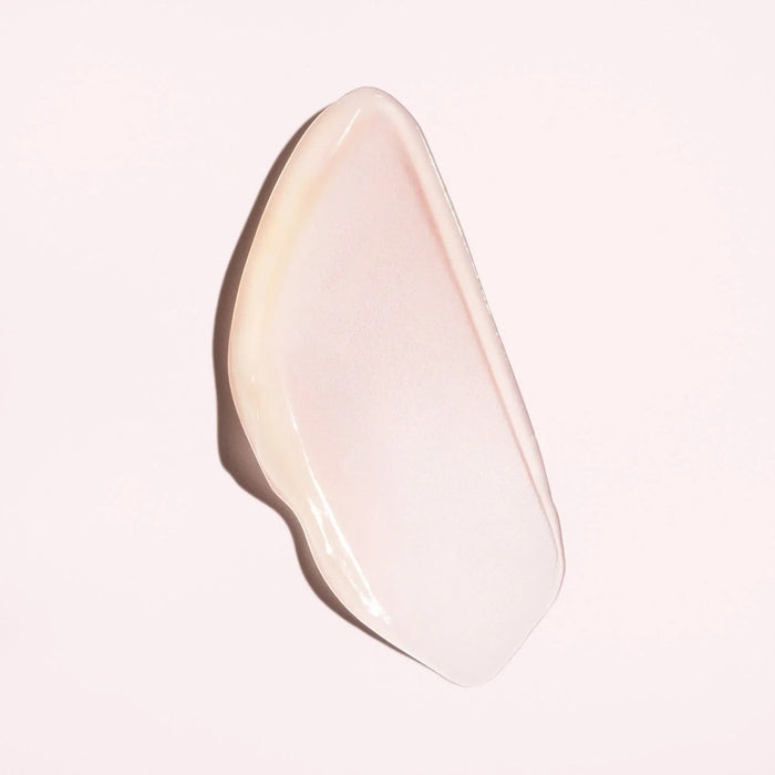 Shop Rescue Spa Serene Scalp Soothing Leave-On Treatment swatch, a light pink, creamy texture on a pale pink background.