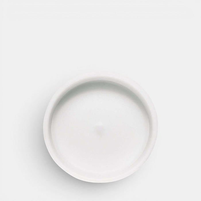 Shop Rescue Spa Silver Mountain Water candle in a minimalist white ceramic jar, top-down view.