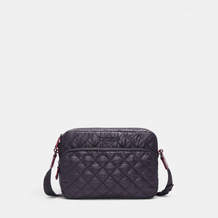 Shop Rescue Spa MZ Wallace black quilted nylon camera crossbody bag with leather trim and adjustable strap.