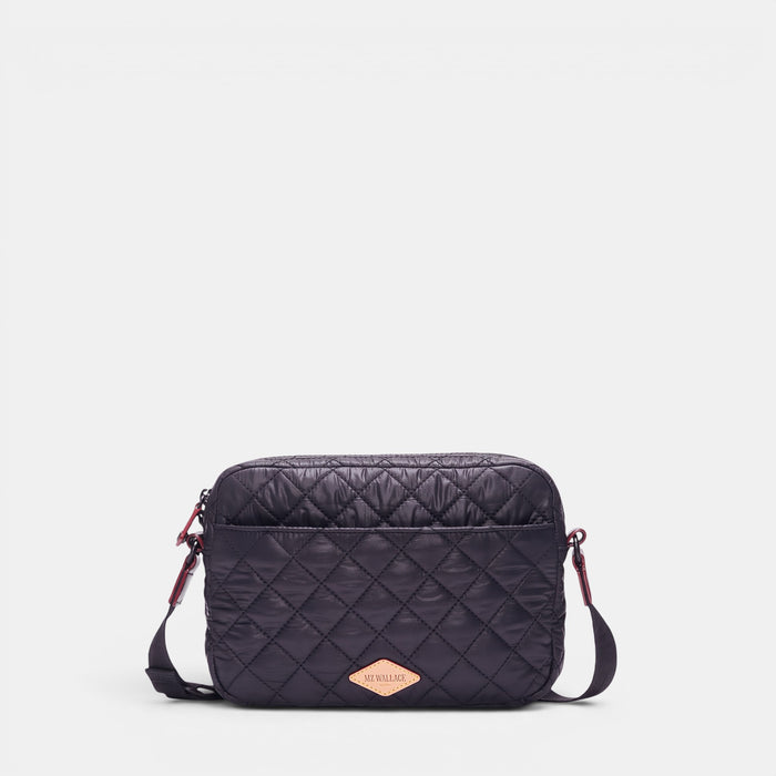 Shop Rescue Spa MZ Wallace black quilted nylon camera crossbody bag with leather trim and adjustable strap.