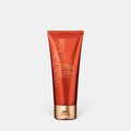Shop Rescue Spa Hampton Sun SPF 30 mineral body lotion in a metallic orange tube with a gold cap.