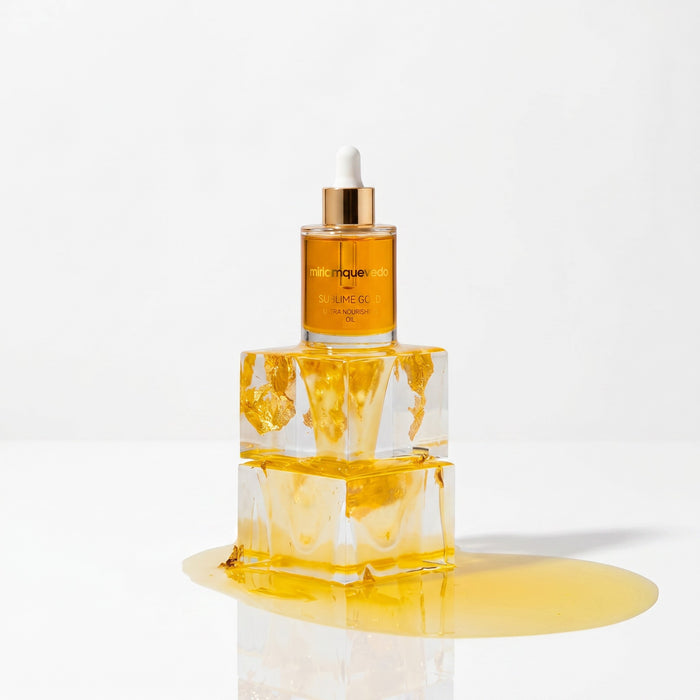 Shop Rescue Spa Sublime Gold Ultra-Nourishing hair oil in a glass dropper bottle resting on a clear acrylic block
