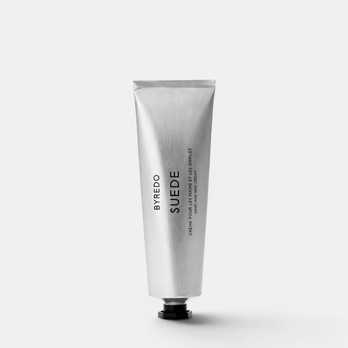 Byredo Suede hand and nail cream in a minimalist silver metal tube with black typography.