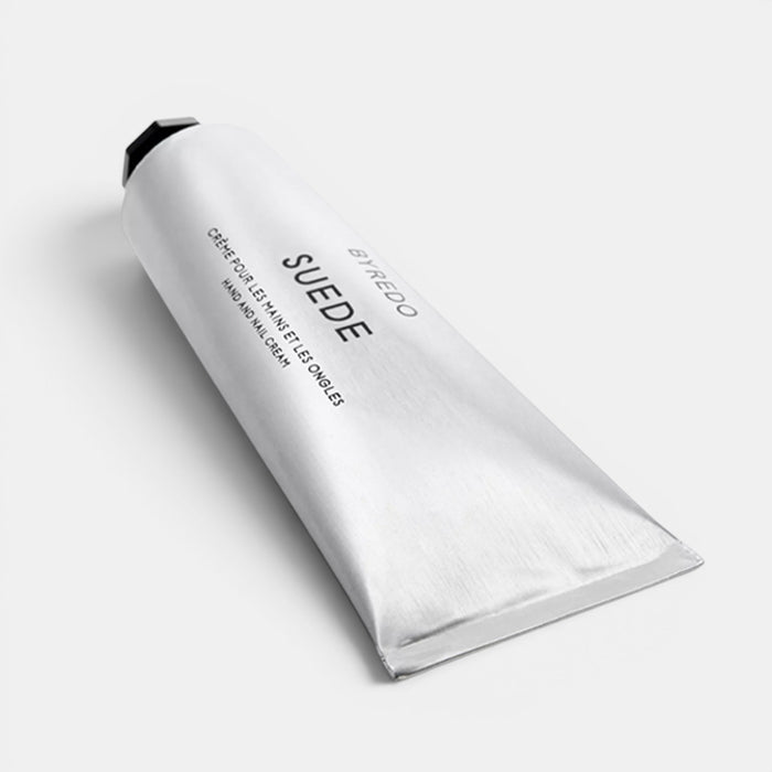 Shop Rescue Spa Byredo Suede hand and nail cream in a sleek silver metal squeeze tube.