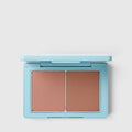 Shop Rescue Spa Sun Tone Bronzing Crème duo in a light blue compact with two complementary tan shades.