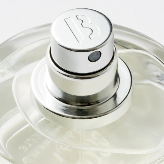 Shop Rescue Spa Super Cedar Eau De Parfum, a genderless woody fragrance with medium intensity in a clear glass bottle with silver cap.