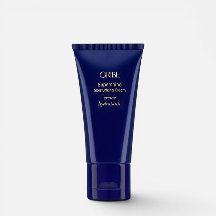 Shop Rescue Spa Oribe Supershine Moisturizing Cream in a dark blue squeeze tube for hydrating and smoothing hair.