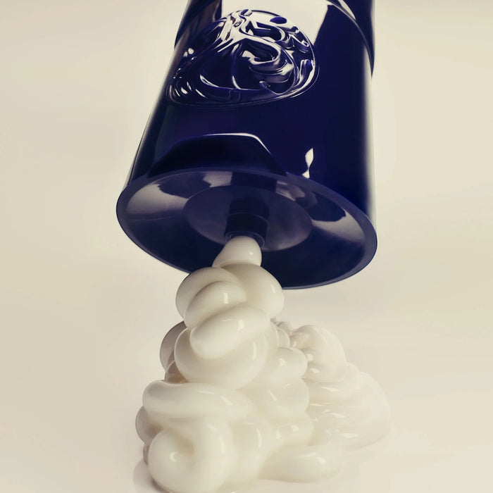 Shop Rescue Spa Supershine Moisturizing Cream dispensing thick white hair conditioner from a dark blue bottle