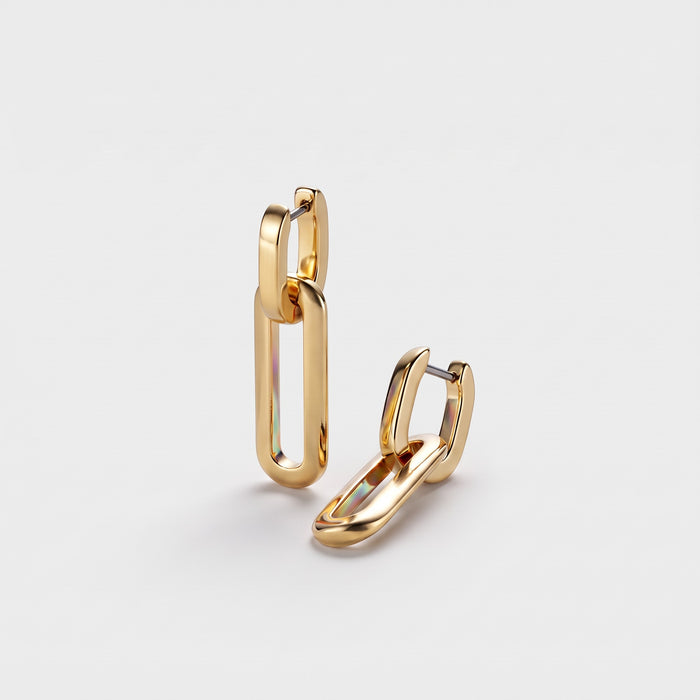 Shop Rescue Spa Teeni 14k gold-dipped brass huggie earrings with detachable polished link drops.