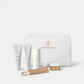 Shop Rescue Spa Danucera On-The-Go Kit featuring six travel-sized skincare products in a signature white beauty bag.