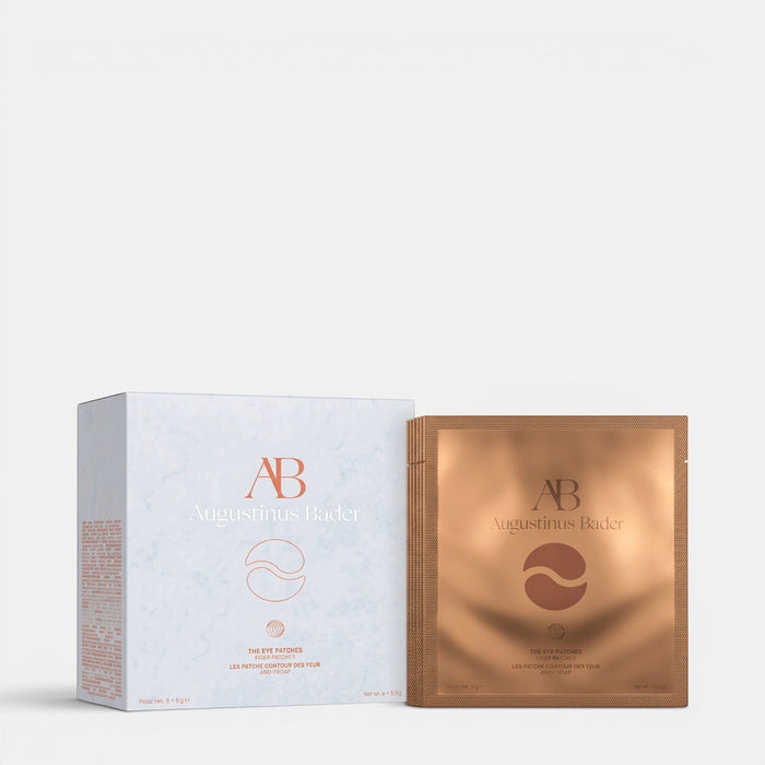 Shop Rescue Spa Augustinus Bader The Eye Patches box and individual hydrogel treatment sachet for under-eye care.