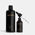 Shop Rescue Spa Eighth Day Performance Duo set with black resurfacing tonic bottle and regenerative serum dropper.