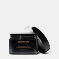 Shop Rescue Spa Eighth Day Resurfacing Tonic Pads in a black jar with one textured exfoliating pad on top