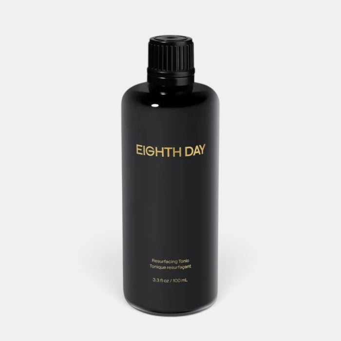 Shop Rescue Spa Eighth Day Resurfacing Tonic in a sleek black 100ml bottle for chemical exfoliation.