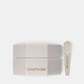 Shop Rescue Spa Eighth Day Ultra-Rich Intensive Moisturizer in a white hexagonal jar with a matching applicator spoon
