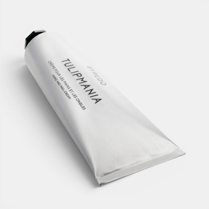Shop Rescue Spa Byredo Tulipmania hand and nail cream in a silver metal squeeze tube on a white background.