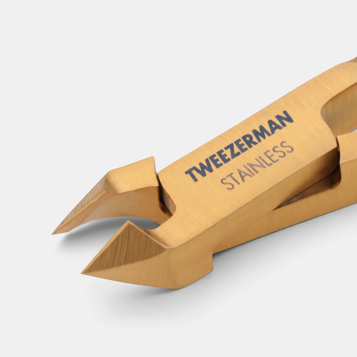 Tweezerman Ultra Precision Nipper in gold titanium-coated stainless steel with ultra-thin blades.