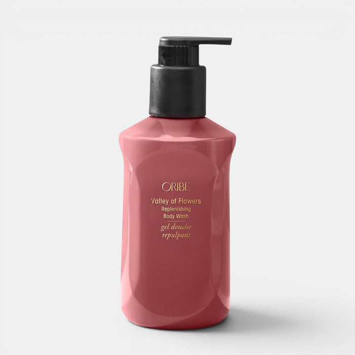 Shop Rescue Spa Oribe Valley of Flowers replenishing body wash in a dusty rose bottle with a black pump dispenser.