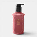 Shop Rescue Spa Oribe Valley of Flowers replenishing body wash in a dusty rose bottle with a black pump dispenser.