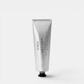 Shop Rescue Spa Byredo Vetyver Hand & Nail Cream in a minimalist silver 50ml tube with black text.