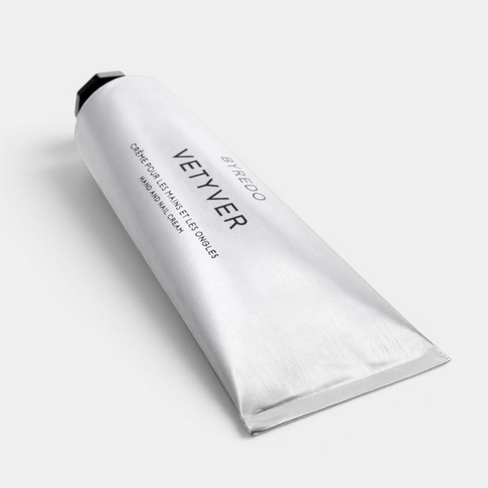 Shop Rescue Spa Vetyver Hand & Nail Cream in a sleek silver metal tube for daily moisturizing and woody fragrance.