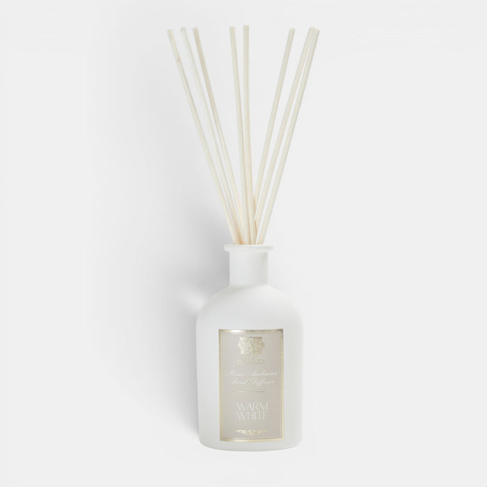 Shop Rescue Spa Antica Warm White reed diffuser in an elegant matte white apothecary bottle with natural reeds.