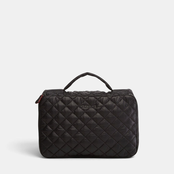 MZ Wallace black quilted Zip Round Organizer with a top handle and wraparound zip closure for travel storage.